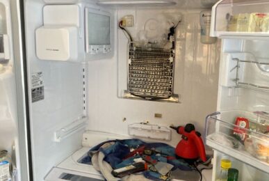 Fridge Repair Service In Progress